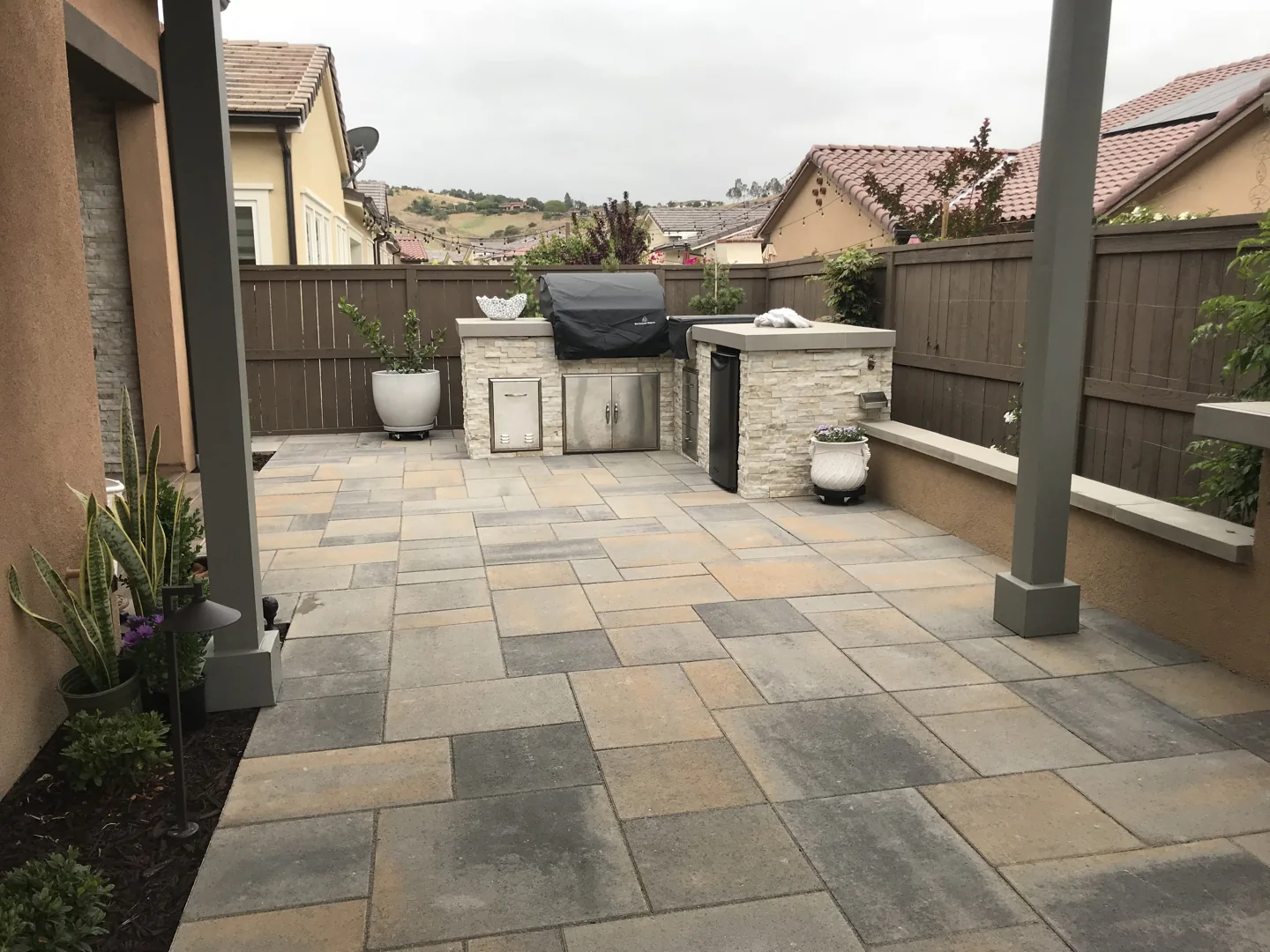 Outdoor kitchen and paved approach