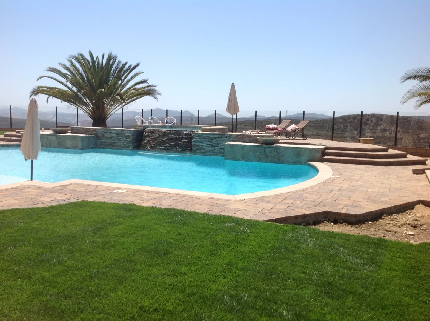 A view across the poolside paving