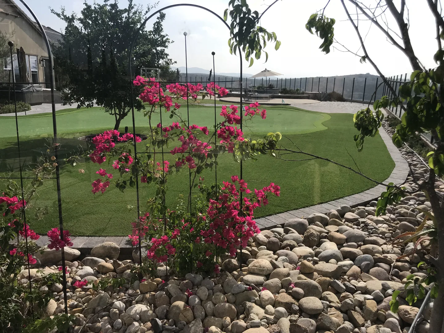 Flowers beneath a garden arbor