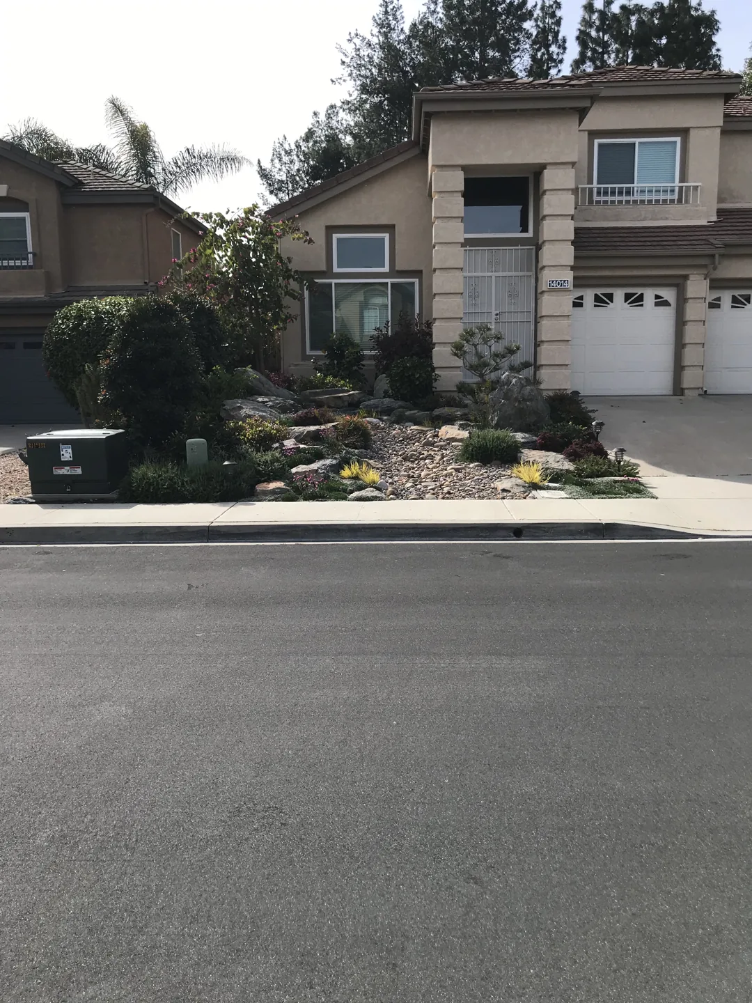 Boulders and planting along the street